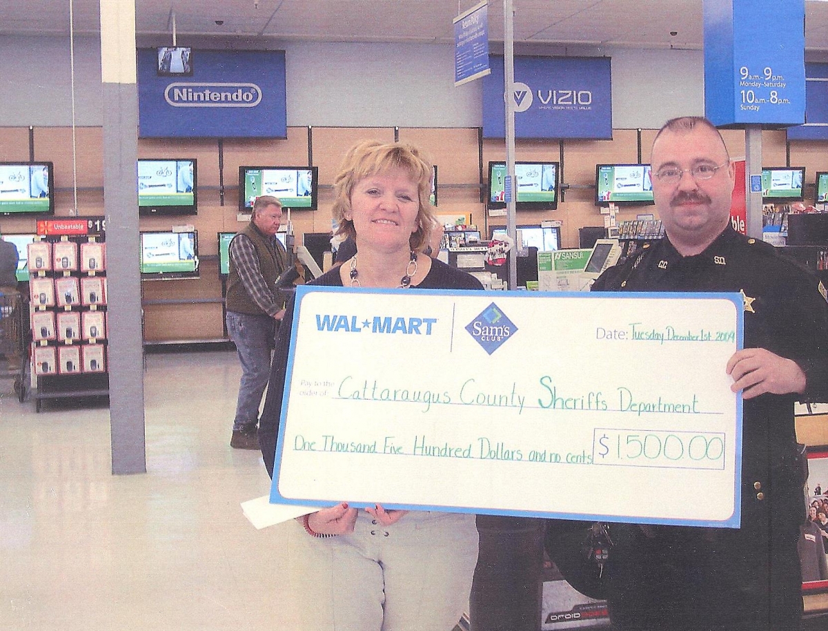 Check presented to the Santa Sheriff's Program from Walmart in 2009