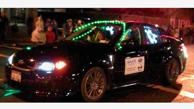Subaru decorated by the Dept. of Aging at the 2012 Santa Claus Lane Parade
