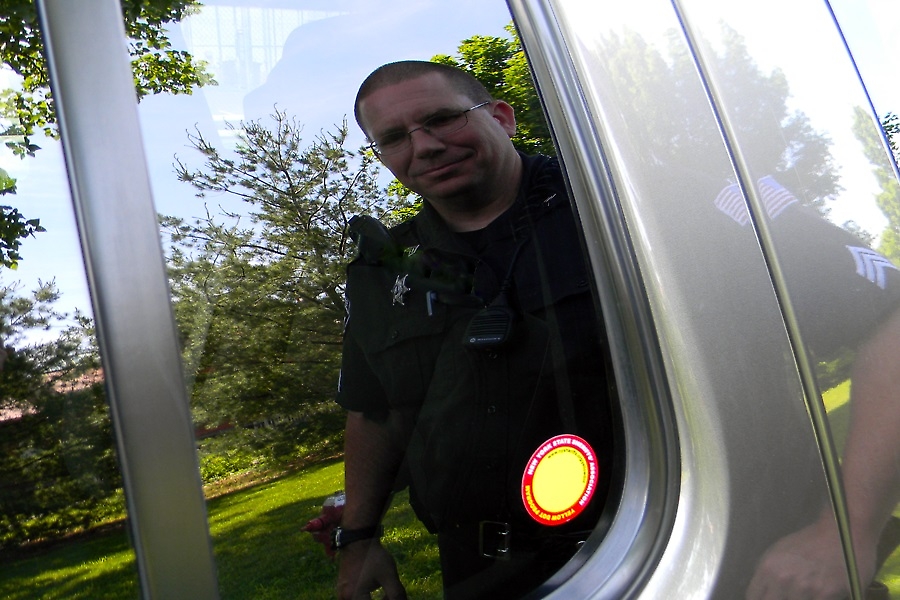 Yellow Dot in driver's-side rear window