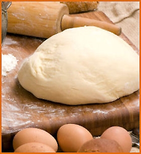 Bread dough on wood